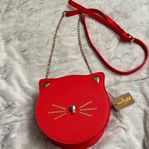 Small red cat purse 6 1/2 inches wide by 6.3 inches long. Brand new